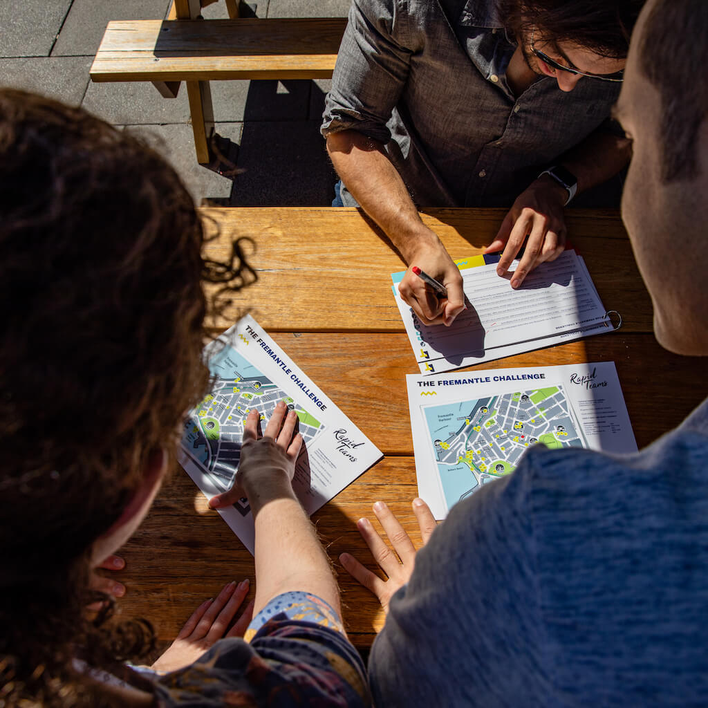 Team looking at a map