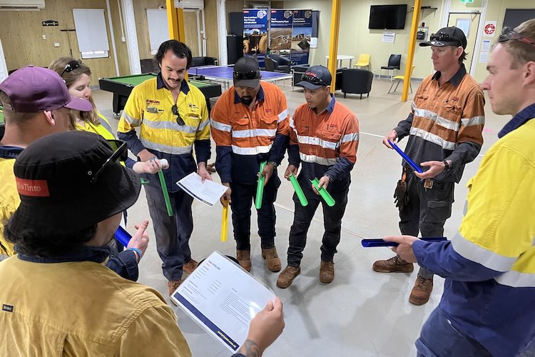 Oil and gas team building session being conducted on the rig